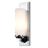 The Amalia 1 Light Large Wall Light - Polished Chrome is a modern wall sconce featuring a polished chrome base and a cylindrical frosted glass shade that emits soft white light. Its sleek design, with an IP44 rating, integrates seamlessly into various contemporary interior settings.