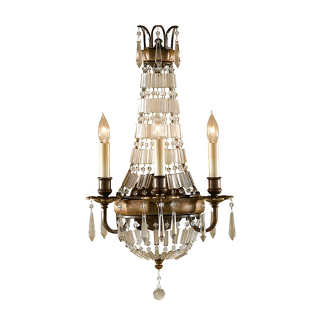 Introducing the Bellini 3 Light Wall Light in Oxidized Bronze/British Bronze, a vintage masterpiece featuring cascading tiers of antique quartz crystals and ornate detailing. Its Italian-inspired design combined with an oxidized bronze finish delivers an elegant and classic look, enhanced by two candle-shaped bulbs.