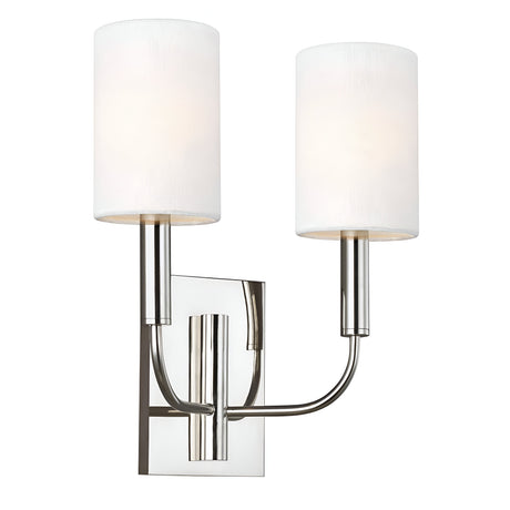 The Brianna 2 Light Wall Light in polished nickel showcases a modern design with dual cylindrical shades. It features a rectangular backplate and two elegantly curving arms, each supporting a lampshade to provide ambient illumination.