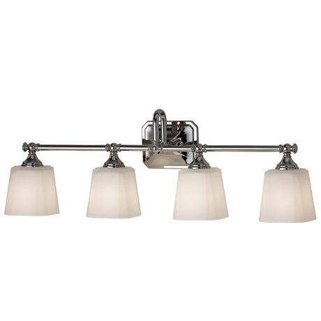 The Concord 4 Light Wall Light - Polished Chrome is mounted on the wall, showcasing sleek, straight lines and four opal-etched glass shades for a soft, even illumination.