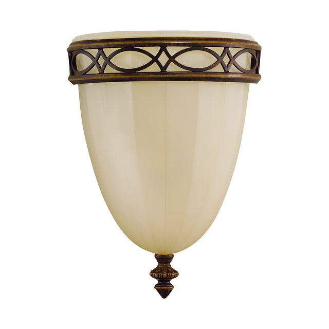 The Drawing-2 Room 1 Light Wall Uplighter in walnut features a wall-mounted design with cream-toned elements reminiscent of vintage, traditional British style. It showcases an Edwardian-inspired look with a fluted glass shade and an ornate bronze band that incorporates a geometric pattern. The base is embellished with a small decorative finial, offering an ambient glow.