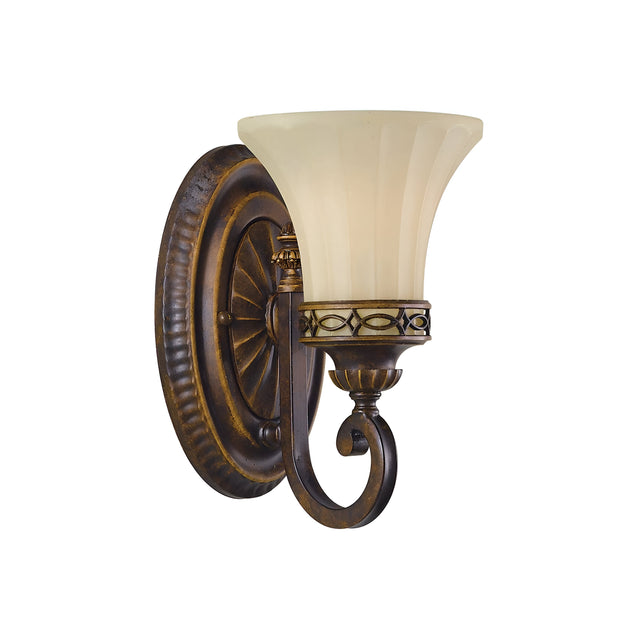 The Drawing-1 Room 1 Light Wall Light - Walnut is a vintage-style wall sconce with Edwardian design and charm, featuring a bronze finish. It showcases an upward-facing frosted glass shade resembling an inverted bell, mounted on a decorative curved arm and round base, all crafted from die-cast aluminum for timeless elegance.