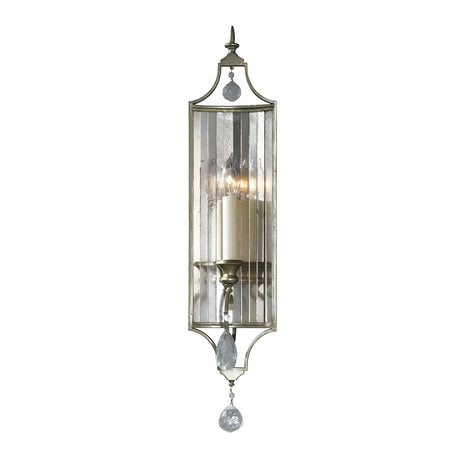 Introducing the Gianna 1 Light Wall Light in Gilded Silver, a stunning decorative wall sconce featuring a single candle-like light encased in a vertical glass panel. Adorned with clear crystal accents at the top and bottom, it offers vintage charm ideal for Italian interiors.