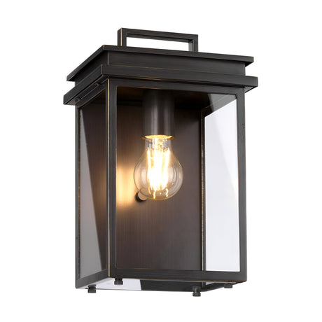 The Glenview 1 Light Outdoor Medium Wall Lantern - Antique Bronze is a modern, rectangular outdoor wall lantern with clear glass panels that beautifully display an exposed light bulb. Its sleek antique bronze finish infuses a touch of prairie-style design into any exterior space.