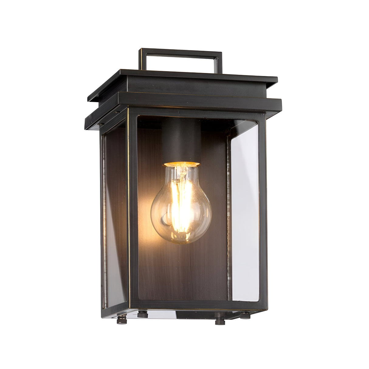 Introducing the Glenview 1 Light Outdoor Small Wall Lantern in antique bronze, featuring a modern rectangular design with clear glass panels and a sleek black metal frame. Its glowing light bulb inside enhances its charm, providing a timeless elegance to your exterior décor.