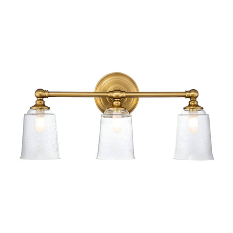 The Huguenot Lake 3 Light Wall Light in burnished brass exudes a Colonial design. This sophisticated fixture features three lights with opaque seeded glass shades. Its central circular base and two horizontal bars lend a timeless appeal, while the slightly tapered shades reveal a speckled detail.
