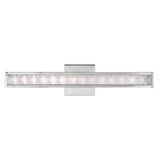 Introducing the Jessie 1 Light LED Wall Light in Polished Chrome, a contemporary rectangular fixture that showcases a central geometric pattern with triangular shapes. This sophisticated design emits a soft white glow, beautifully enhancing the elegance of its faceted crystal accents.