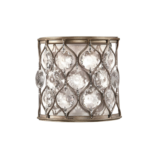 The Lucia 1 Light Wall Light in Burnished Silver features a metallic frame with an intricate lattice-like design. It is adorned with multiple clear, teardrop-shaped Bauhinia crystals, offering an elegant and sophisticated look perfect for any refined space.