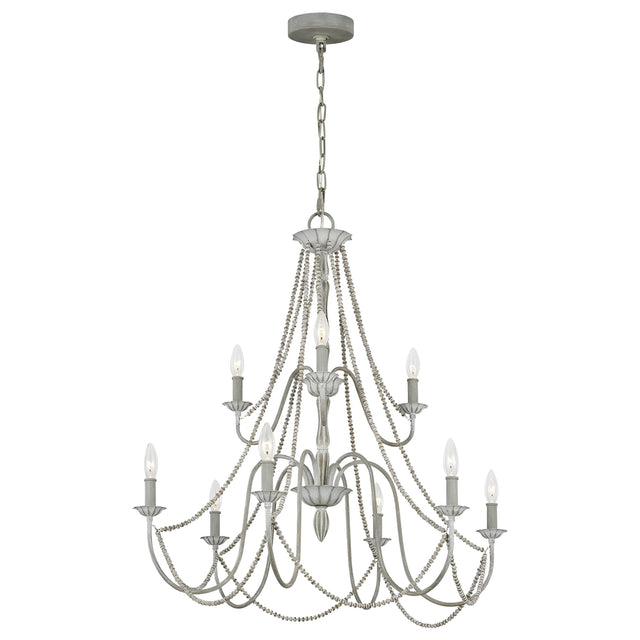 The Maryville 9 Light Chandelier - Washed Grey embodies French Country elegance with its two-tiered, nine candle-style lights. Its design includes graceful cascading chains and an intricately detailed metal frame, adding a touch of rustic charm to any room while being stylishly suspended by a chain from a circular ceiling mount.