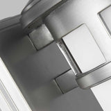 Close-up of the Newport 1 Light Outdoor Small Wall Lantern, featuring a sleek, angular design and a brushed steel finish. The image emphasizes the structure of this outdoor wall lantern, showcasing its modern and minimalistic aesthetic that exudes coastal elegance against a subtle background.