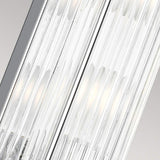 A close-up view of the Paulson 4 Light Bar Light - Chrome showcases its modern design, featuring parallel rows of thin, transparent rods that encase bright white lights. The sleek design and chrome elements contribute to an elegant and contemporary appearance.