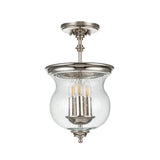 The Pickering Lane 3 Light Semi Flush in polished nickel showcases a clear glass dome shade with visible bulbs and decorative detailing in a traditional design. Hanging from a short rod, it delivers a vintage-inspired aesthetic that enhances any space with farmhouse lighting charm.