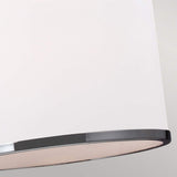 The Prospect Park 3 Light Island Chandelier features a modern lampshade with a smooth white surface complemented by a shiny satin nickel rim, highlighting its minimalist design. The fixture showcases opal etched glass details in a soft, neutral color palette.