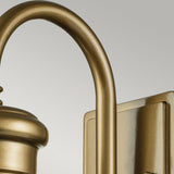 Featuring the Redding Station 1 Light Outdoor Medium Wall Lantern in a sleek bronze finish, this wall-mounted fixture showcases a vintage allure with its elegant curved design against a neutral backdrop, combining both modern aesthetics and smooth craftsmanship.