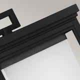 Here's a revised sentence using the product data:

"Close-up of the Roscoe 1 Light Outdoor Large Wall Lantern in black, showcasing its frosted glass panel. The frame embodies a minimalistic design with right angles and a smooth surface, offering a contemporary and sleek aesthetic ideal for outdoor use.
