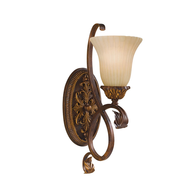 The Sonoma Valley 1 Light Wall Light in cream and bronze features a detailed floral design and a fluted frosted glass shade, evoking the charm of French country antiques.