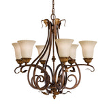 The Sonoma Valley 6 Light Chandelier in Cream/Bronze is a decorative piece featuring six vintage-style lamps, each adorned with opal glass shades. Its ornate bronze metal frame is embellished with intricate scrollwork and leaf details, capturing the essence of French Country antiques.