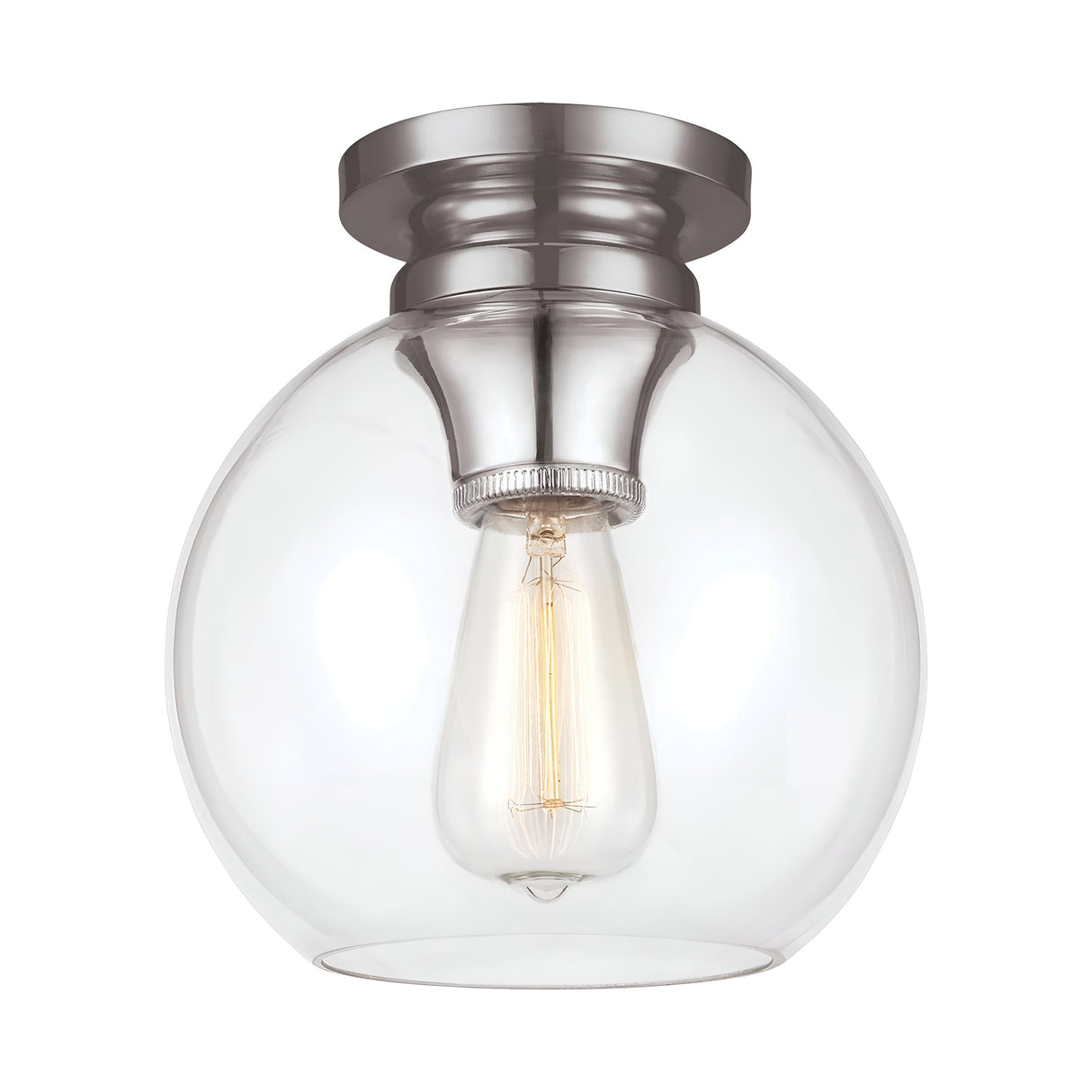 The Tabby 1 Light Flush - Polished Nickel is a ceiling-mounted fixture that showcases a round, clear glass globe with an exposed filament bulb. The base features a polished nickel finish with a brushed texture. This piece combines contemporary lighting design with simplicity, offering a warm and inviting glow.