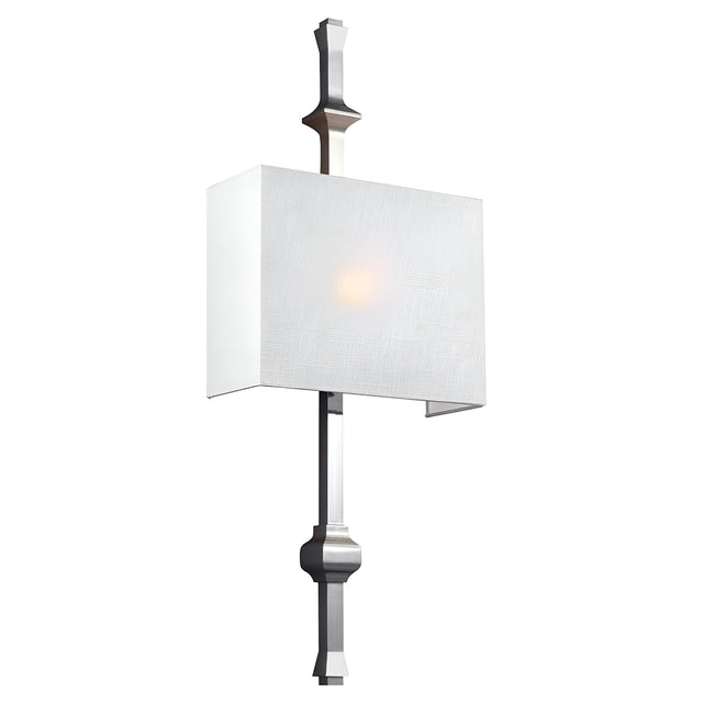 The Teva 1 Light Wall Light - Polished Nickel features a modern design with a rectangular white lampshade and a sleek metallic base in polished nickel, highlighting its geometric style. Emitting a gentle glow, this wall sconce effortlessly enhances any space.