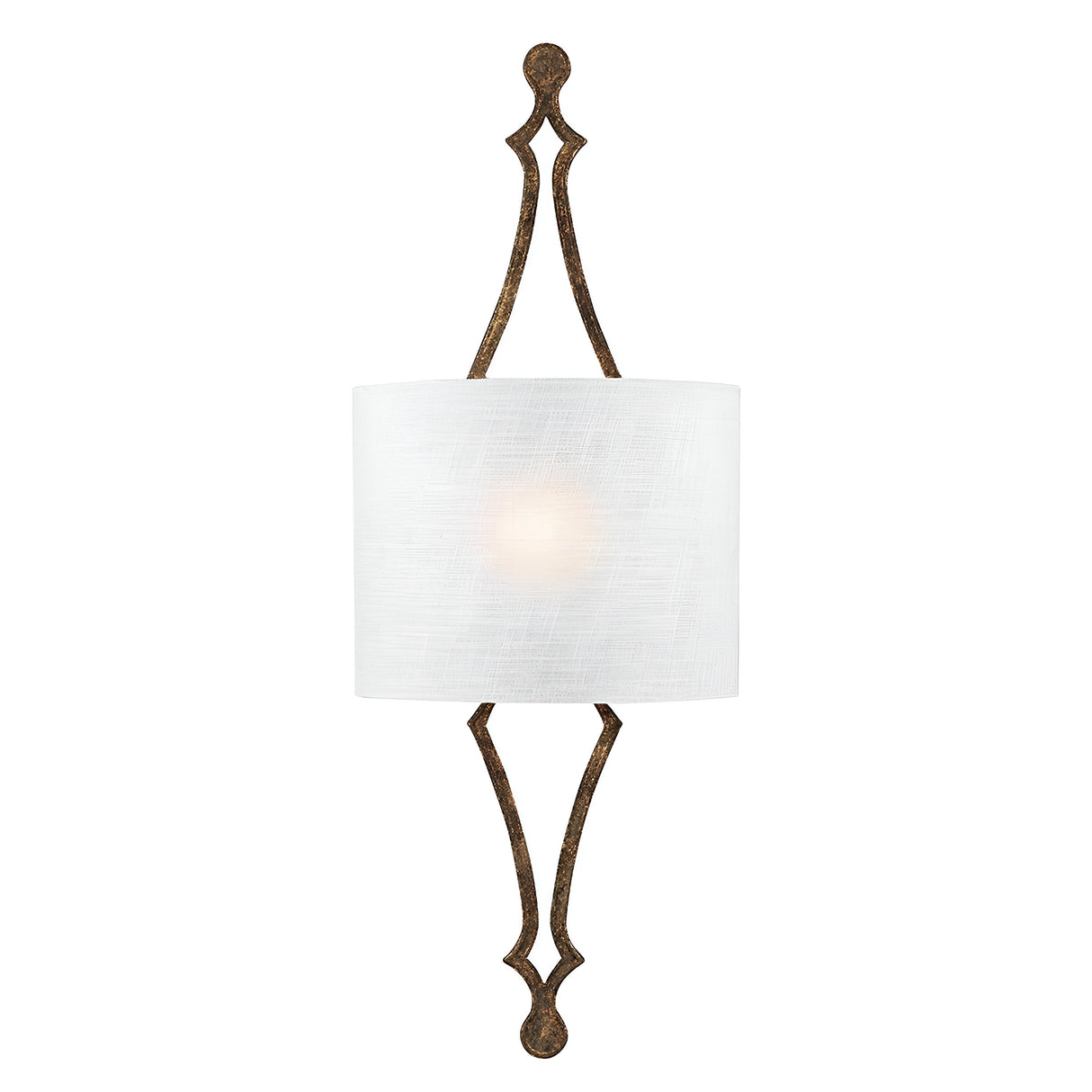 The Tilling 1 Light Wall Light in Antique Gold features a traditional design with an elongated, decorative metal frame and a dark finish. It is adorned with a cylindrical white linen shade that emits a soft glow at its center, offering an elegant and symmetrical aesthetic.