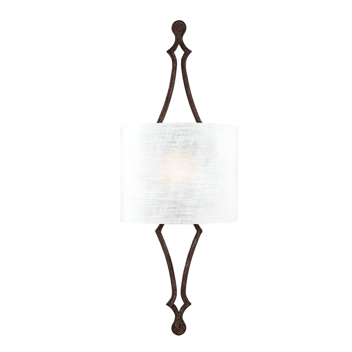 The Tilling 1 Light Wall Light - Weathered Iron features a decorative wall sconce with an intricate weathered iron frame and a cylindrical white linen shade, casting a warm glow from within.