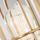 Close-up of the Urban Renewal 1 Light Wall Light in dark antique brass, featuring an Edison-style bulb encased within elegantly crafted metal bars. The softly blurred background enhances the focus on the intricate design and warm industrial elegance of this light fixture.