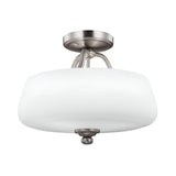 The Vintner 3 Light Semi Flush - Satin Nickel features an opal etched glass shade. This fixture showcases a modern, sleek design with smooth curves and a round base, making it ideal for any contemporary space.