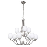 The Vintner 9 Light Chandelier in a satin nickel finish features eight opal etched glass shades, stylishly arranged in two tiers. The fixture hangs from a chain, highlighting its sleek, curved design.