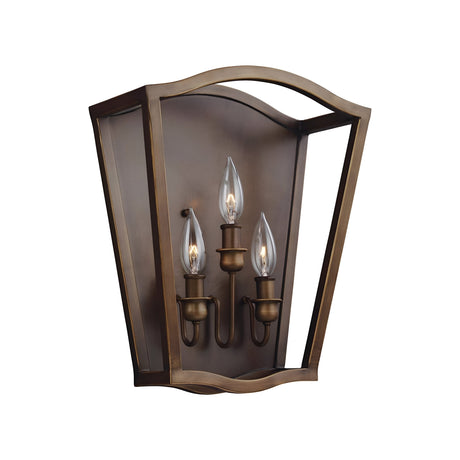 The Yarmouth 3 Light Wall Light in Painted Aged Brass is a bronze wall sconce characterized by its rectangular frame and clear glass panels, elegantly highlighting three candle-style bulbs at its center. The timeless design, echoing traditional lanterns, includes an aged brass finish along with subtly curved top and bottom edges for a classic aesthetic.