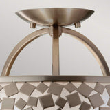 Close-up of the Zara 3 Light Semi Flush- Brushed Steel ceiling fixture highlighting its contemporary design. This modern piece is adorned with a brushed steel finish and a decorative square pattern, featuring an arched support structure that is elegantly complemented by a mosaic-like element encircling the light casing.