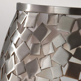 Close-up of the Zara 1 Light Wall Light - Brushed Steel, showcasing a geometric design with overlapping square and rectangular pieces that create a modern and artistic texture, embodying contemporary design.