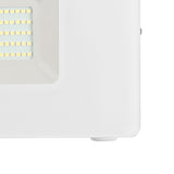 Close-up of the Fesvine LED flood light's corner, showing the white aluminium body, recessed LED panel behind clear glass, and mounting bracket on a plain background.