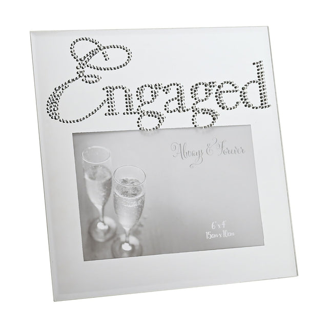Square silver mirror glass photo frame with "Engaged" spelt in crystal script across the top, holding a 6 x 4in champagne glasses photo, shown on a white background.