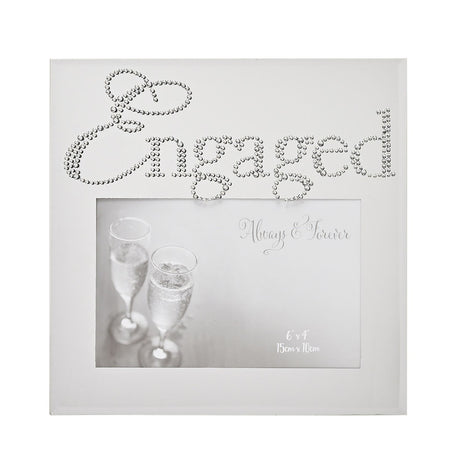 Square glass photo frame with mirrored silver finish, "Engaged" spelled in crystal script above a 6 x 4in photo window on a white background.