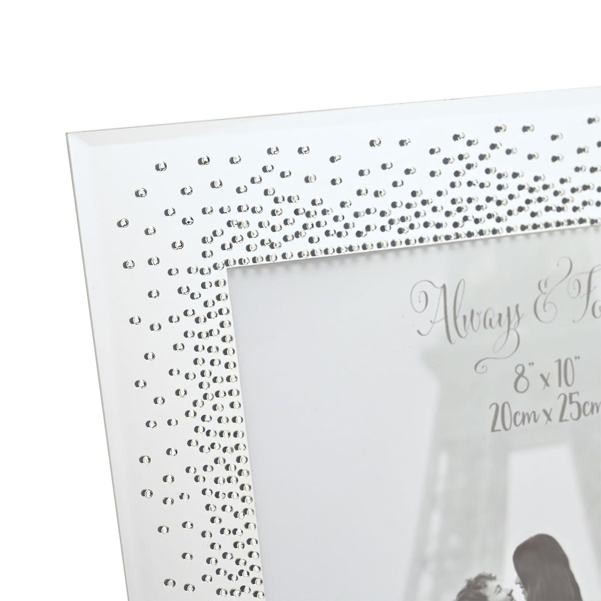 Close-up of a rectangular mirrored photo frame corner with dense clear starburst crystals on a bright silver mirror finish, "Always & Forever 8x10" engraving visible near the opening.