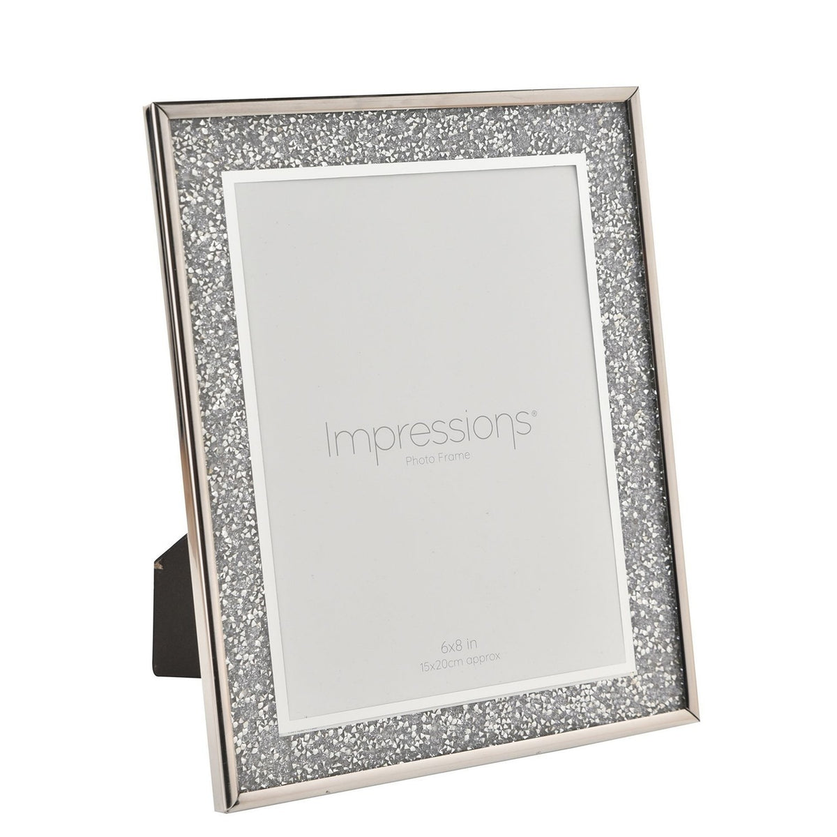 Rectangular glitter photo frame in silver with sparkling border and shiny rim, 6x8in size, shown at an angle on its easel stand against a white background.