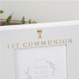 Close-up of the grey freestanding First Communion photo frame with white edges, gold "1ST COMMUNION" lettering and chalice icon above the rectangular 6 x 4in opening.