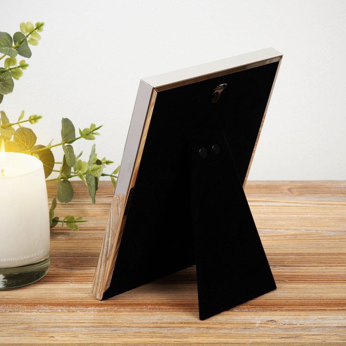 Rear view of the silver Confirmation Dove Metal Box Photo Frame 6 x 4in, showing the fold-out easel stand and hook fitting on a black velvet back panel.