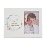 White rectangular photo frame for First Holy Communion with "Special Boy" script, leafy wreath, blue flowers and church illustration beside a 6 x 4in boy's portrait opening.