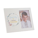 White rectangular 6x4in photo frame with "Special Boy First Holy Communion" text and illustrated wreath of leaves, flowers and a small church, shown with a boy's portrait.