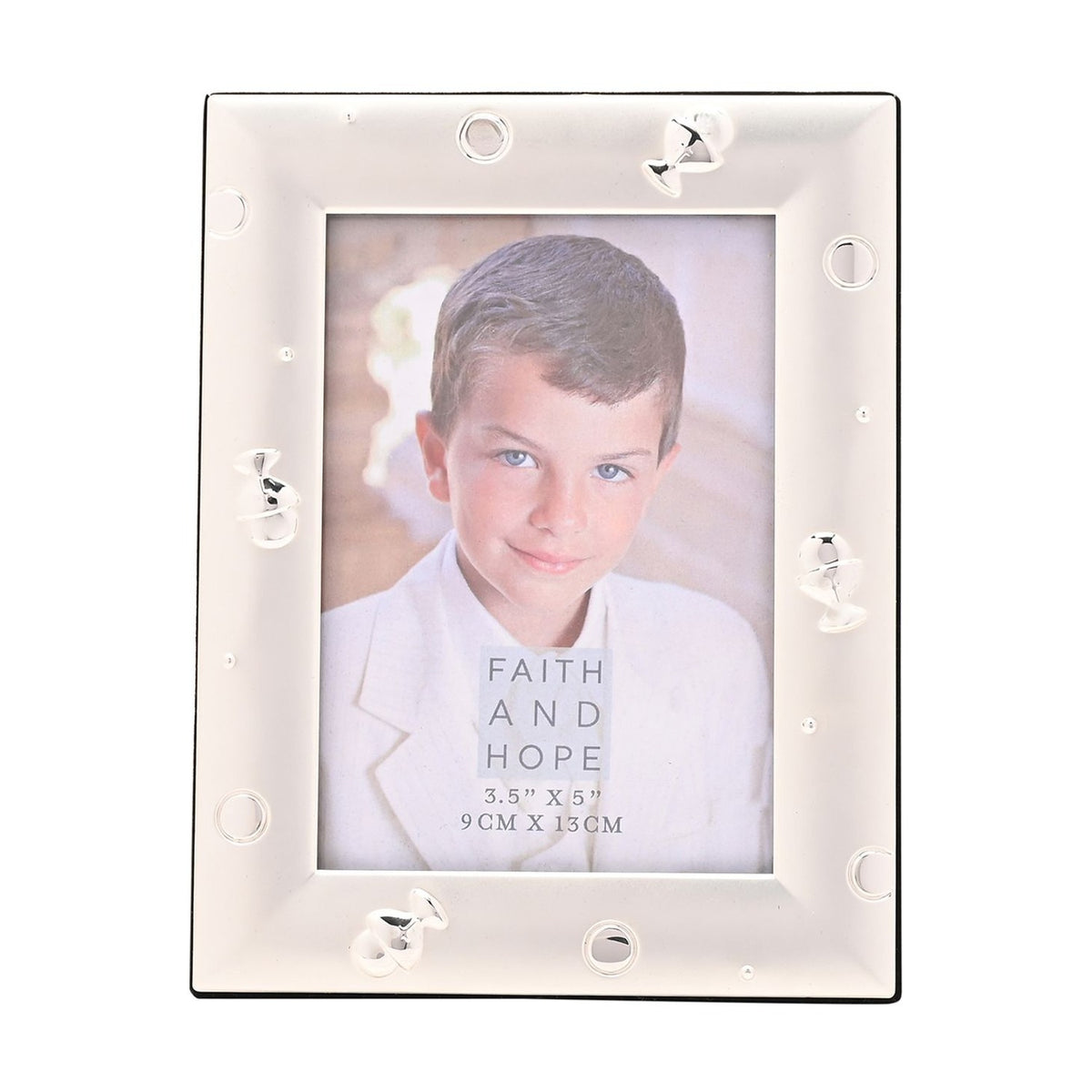 Chalice Scatter Easel metal photo frame in silver, rectangular with a broad sloped border decorated in relief with chalices, rings and dots, holding a 5 x 3.5in portrait photo on a white background.