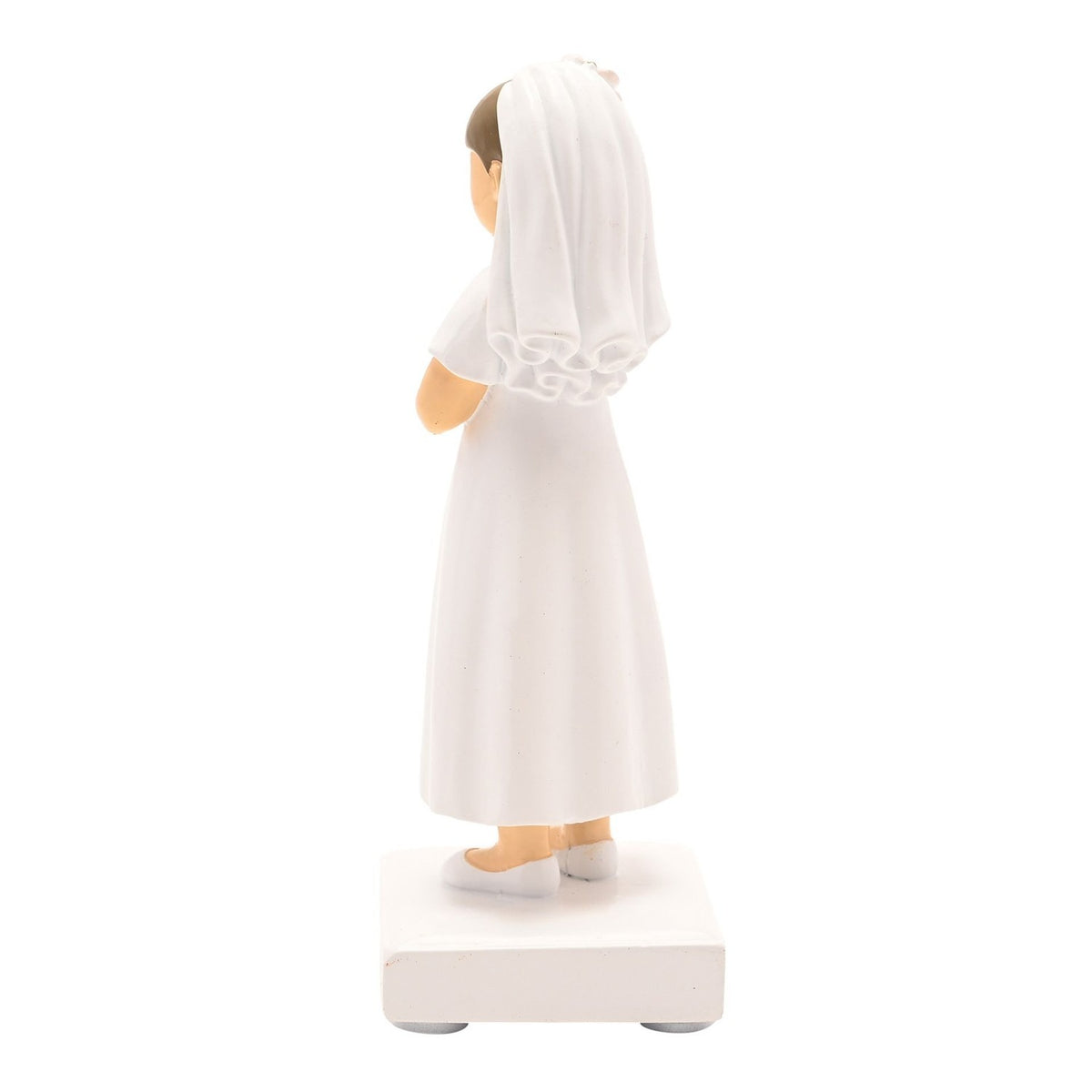 Rear view of a resin Communion girl figurine with light brown hair, wearing a long white dress with puffed sleeves and a flowing veil, hands clasped, on a white base.