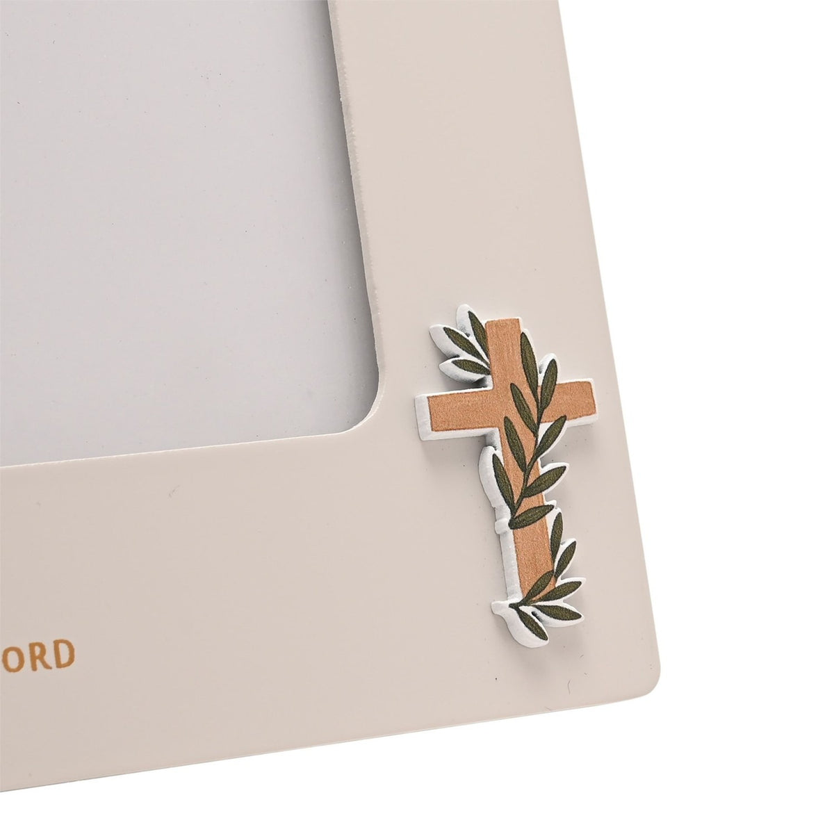 Close-up of the Confirmation Girl Wooden Photo Frame corner in off white, showing a raised cross with olive branch detail and gold capital lettering.