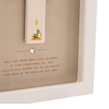Close-up of the Christening Arched Wooden Framed Plaque in white, showing the cream cross with a painted candle and leaves, a silver heart accent, and engraved verse on a beige background.
