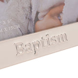 Close-up of the white enamel Baptism photo frame showing raised silver "Baptism" lettering on the bottom band with silver trim along the edge.