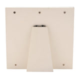 Rear view of the white enamel square photo frame showing the metal back panel, triangular fold-out stand, and four corner mounting screws on a plain background.