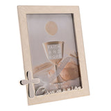 Cream enamel metal photo frame with silver trim, raised silver cross, and "Communion" script, holding a 4"x6" faith-themed image, on a plain white background.