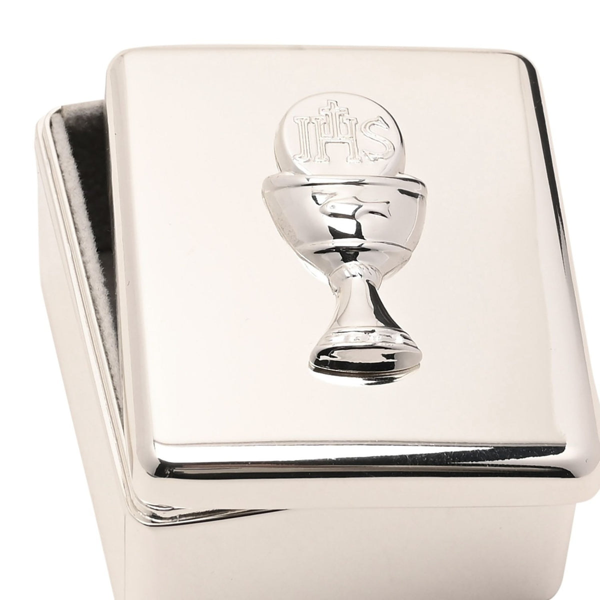 Rectangular silver metal keepsake box with lift-off lid, featuring a raised chalice design and host marked "IHS" on the polished lid.