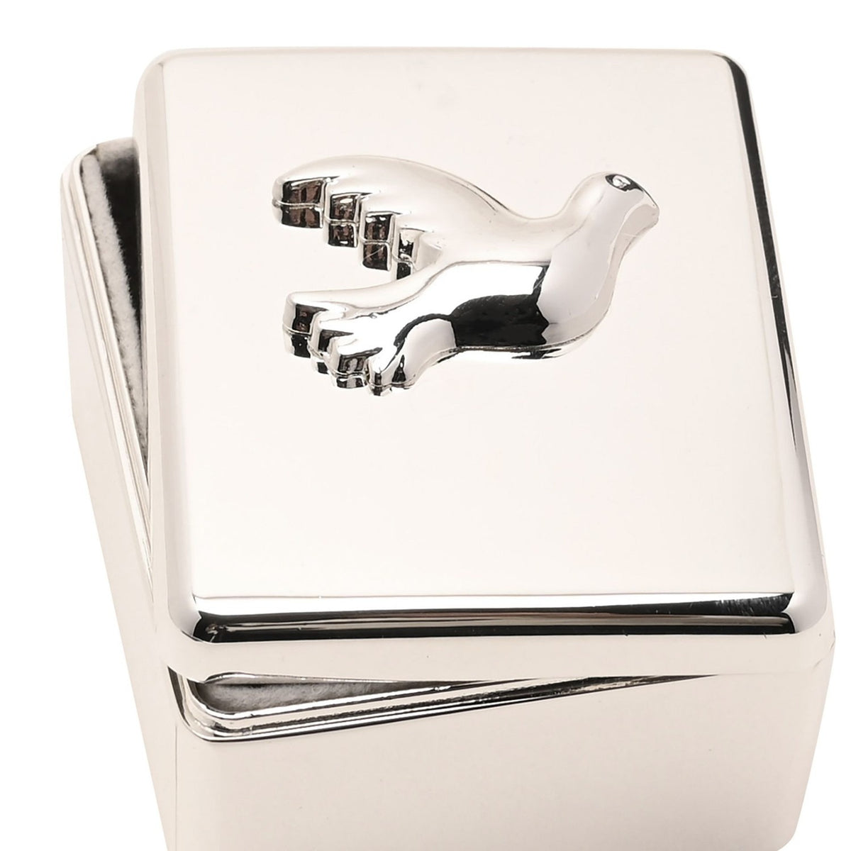 Rectangular silver metal keepsake box with a raised dove in relief on the polished lid, featuring rounded corners, shown in close-up against a plain white background.