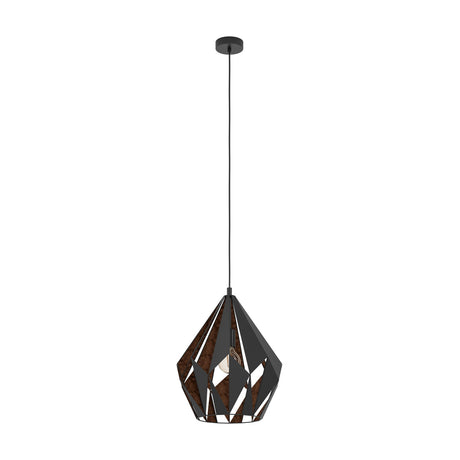 Flermanne pendant light with a faceted geometric steel shade in black with copper interior, hung on a black cord from a round ceiling rose, shown on a white background.